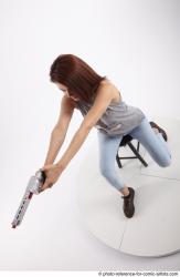 MOLLY SITTING POSE WITH GUN